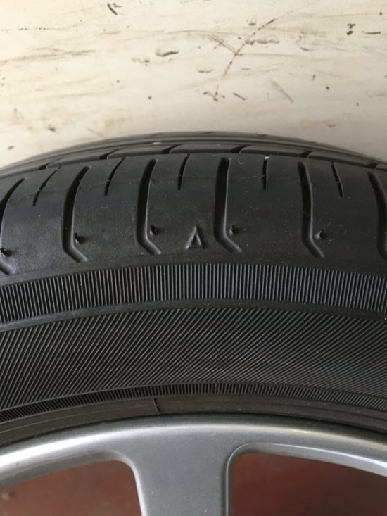 155/65R14，スリップサイン，三角の刻印